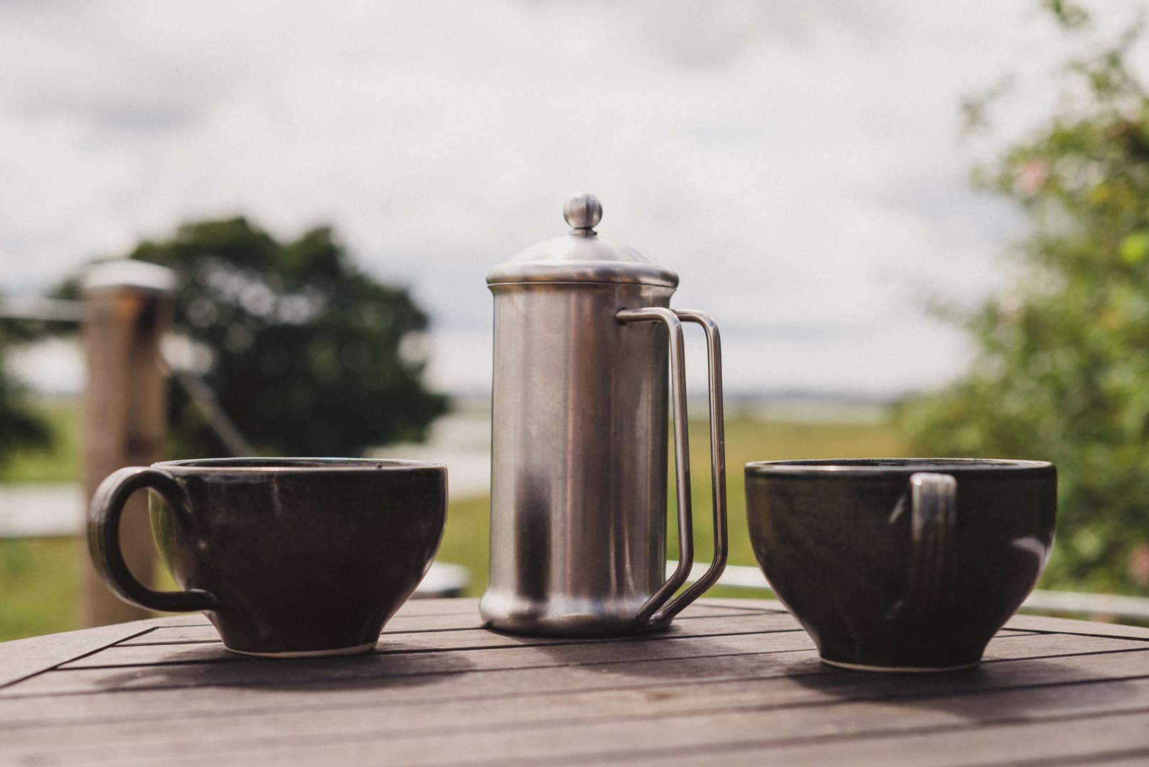 coffee and cups on table
