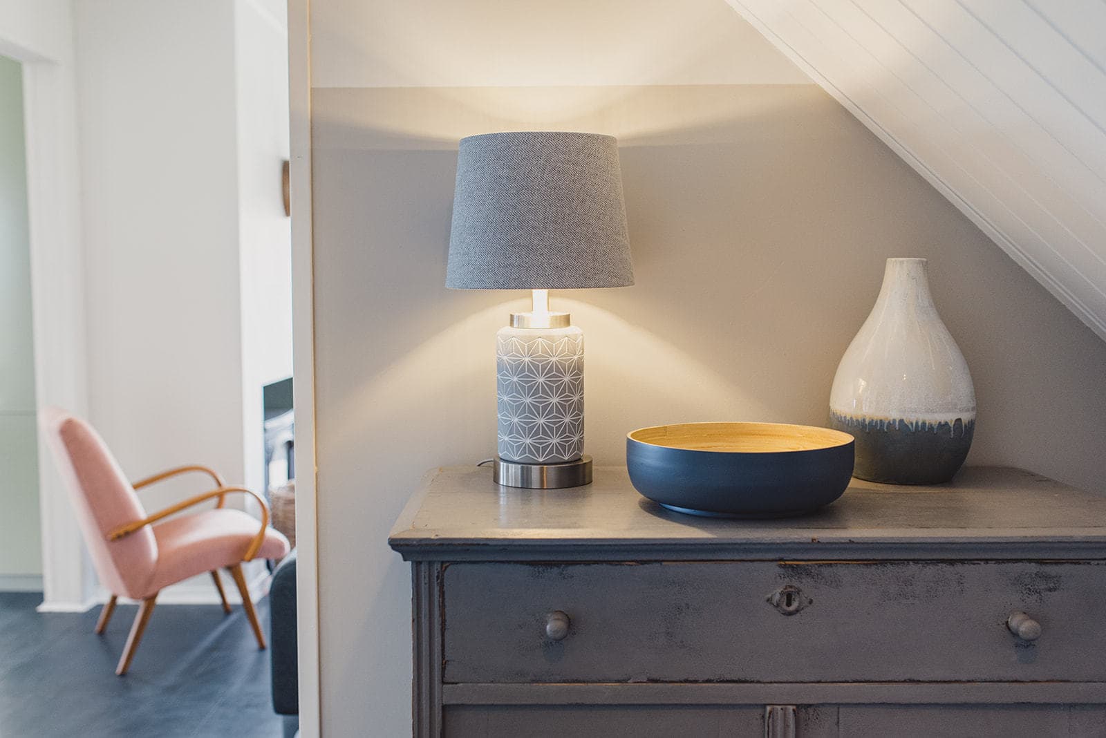Desk with light and vase