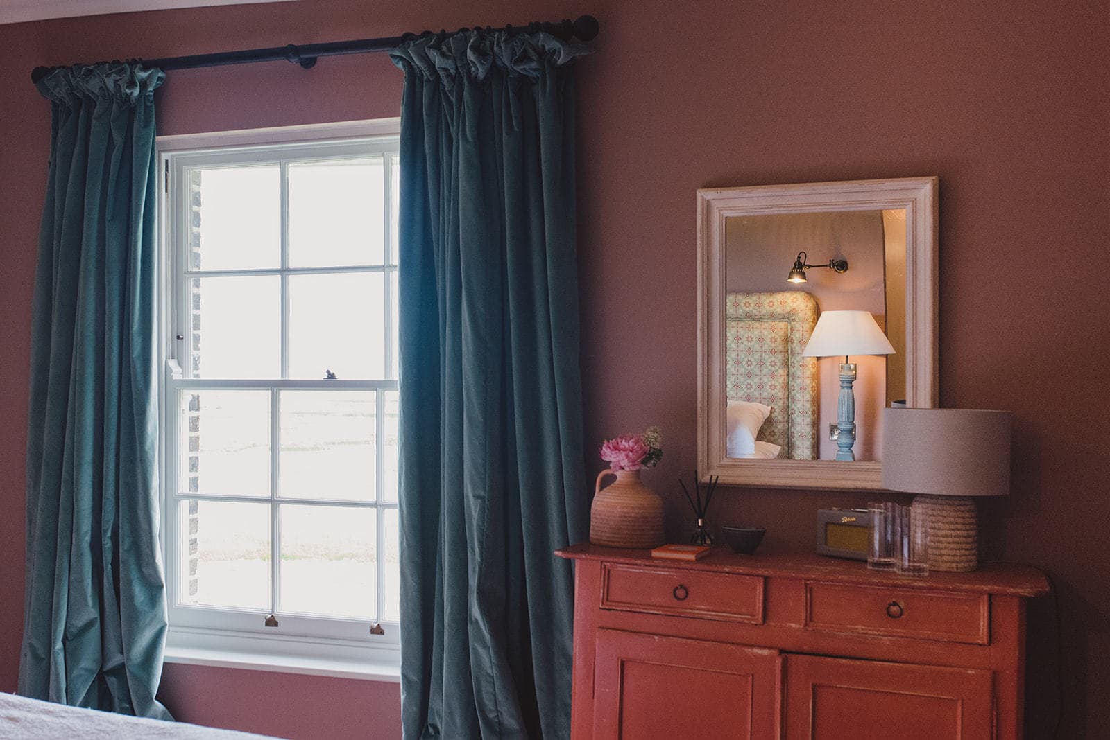 Pink Hotel Room Window next to dressing table