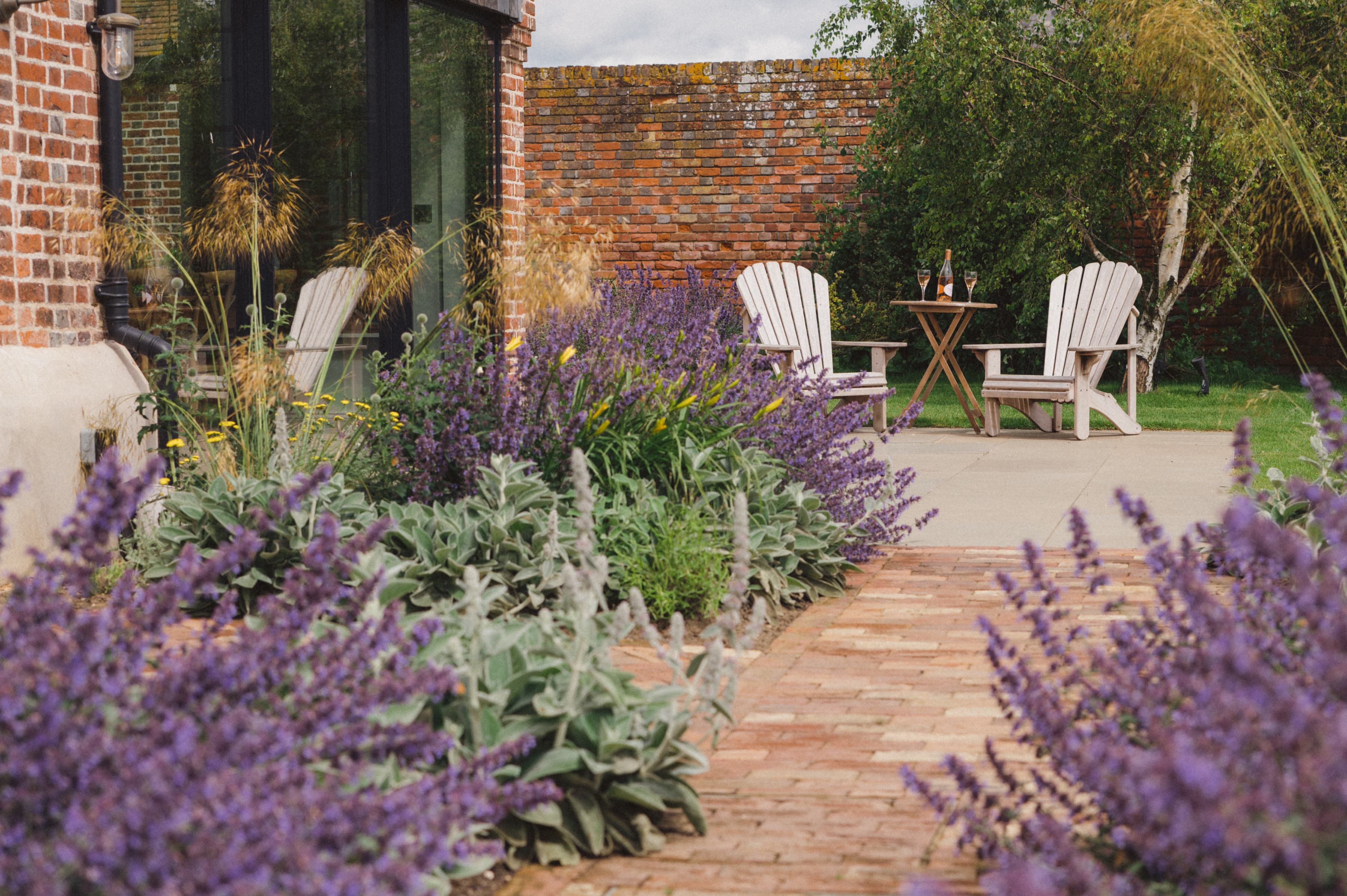 Wrap around gardens with a view of the reserve