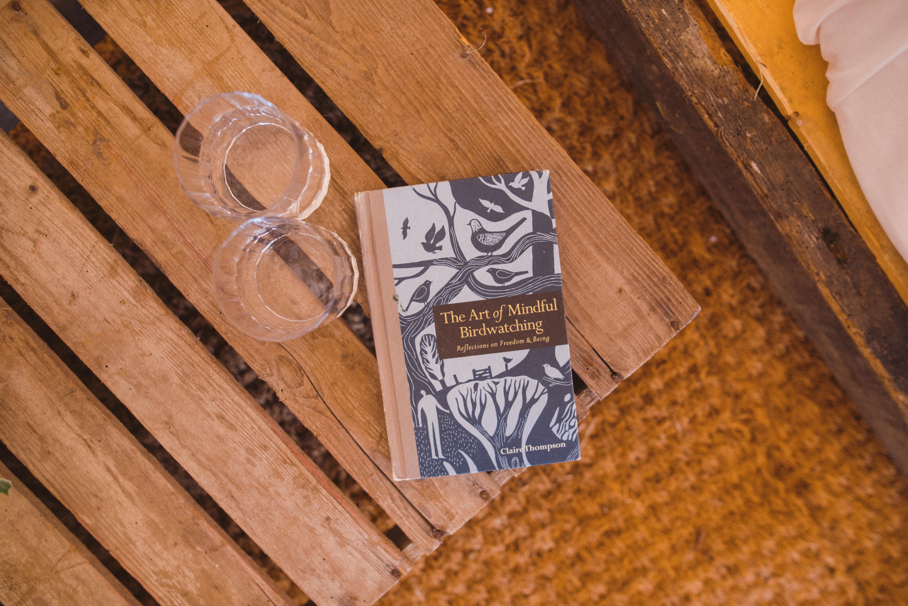book and glasses on table
