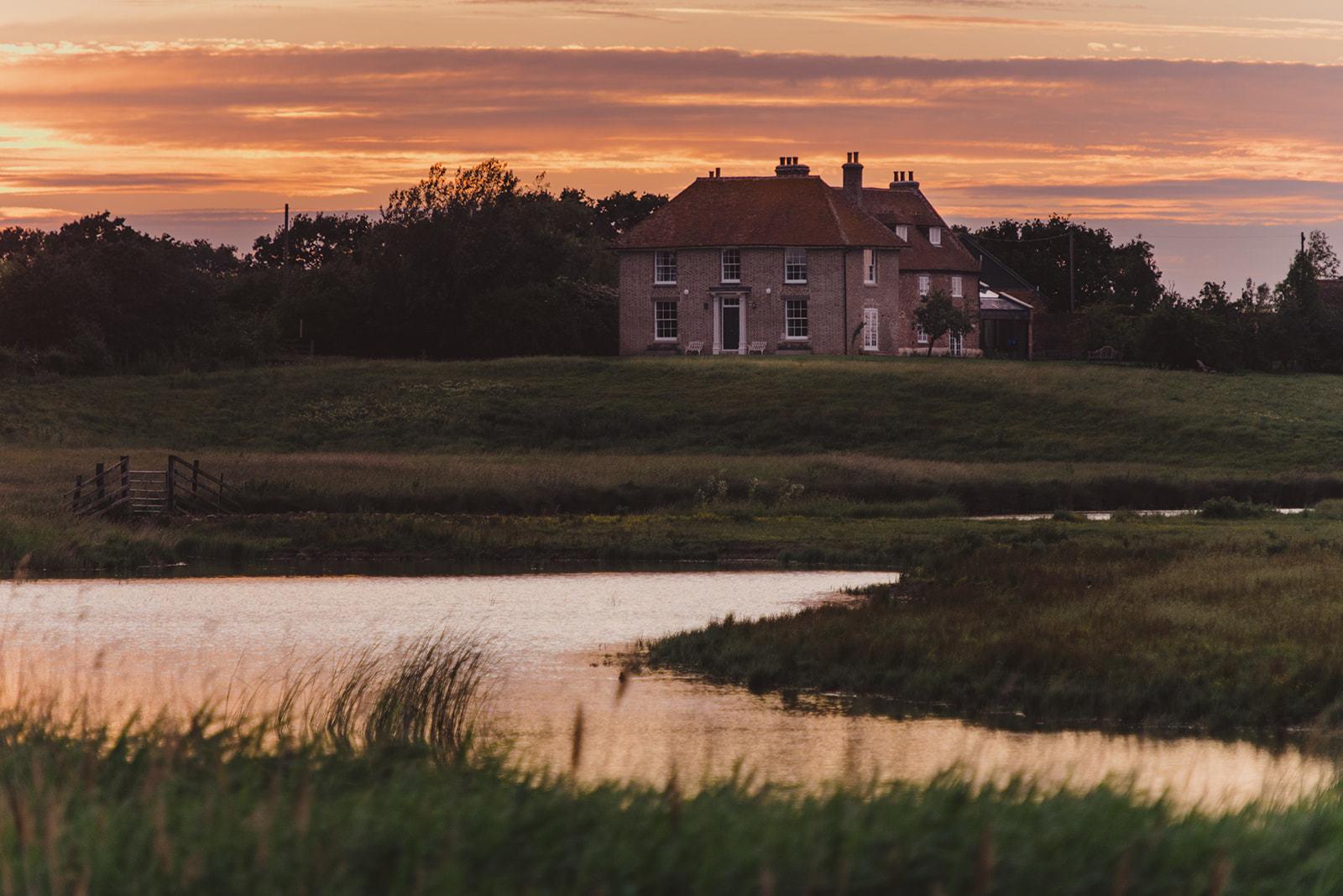 Kingshill Farmhouse sunrise over the marshes